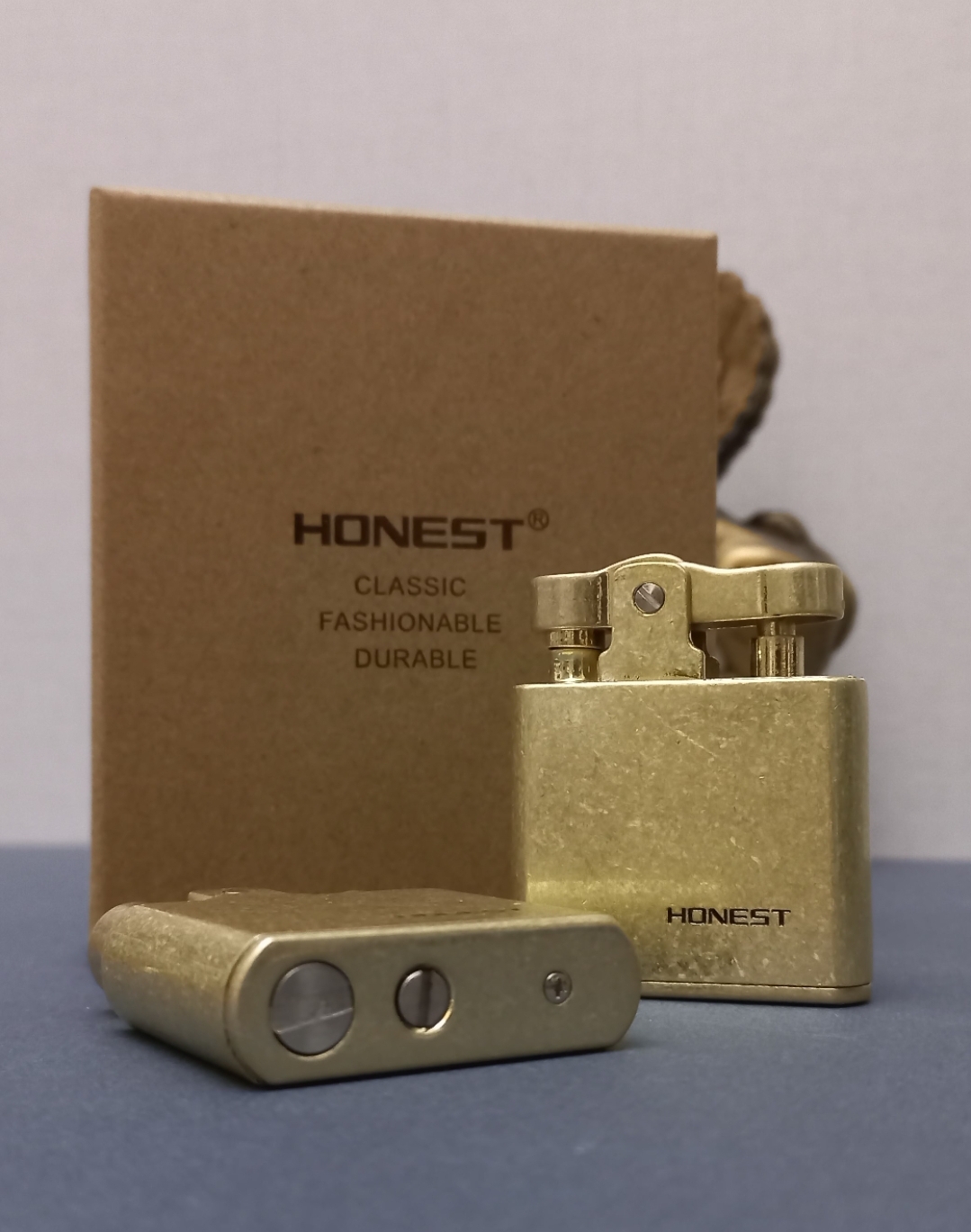 فندک بنزینی برند آنست HONEST طرح رانسون مدل آنتیک زیرخاکی